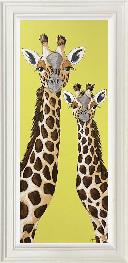 a tall duo framed original of two giraffes on a yellow background by artist amy louise