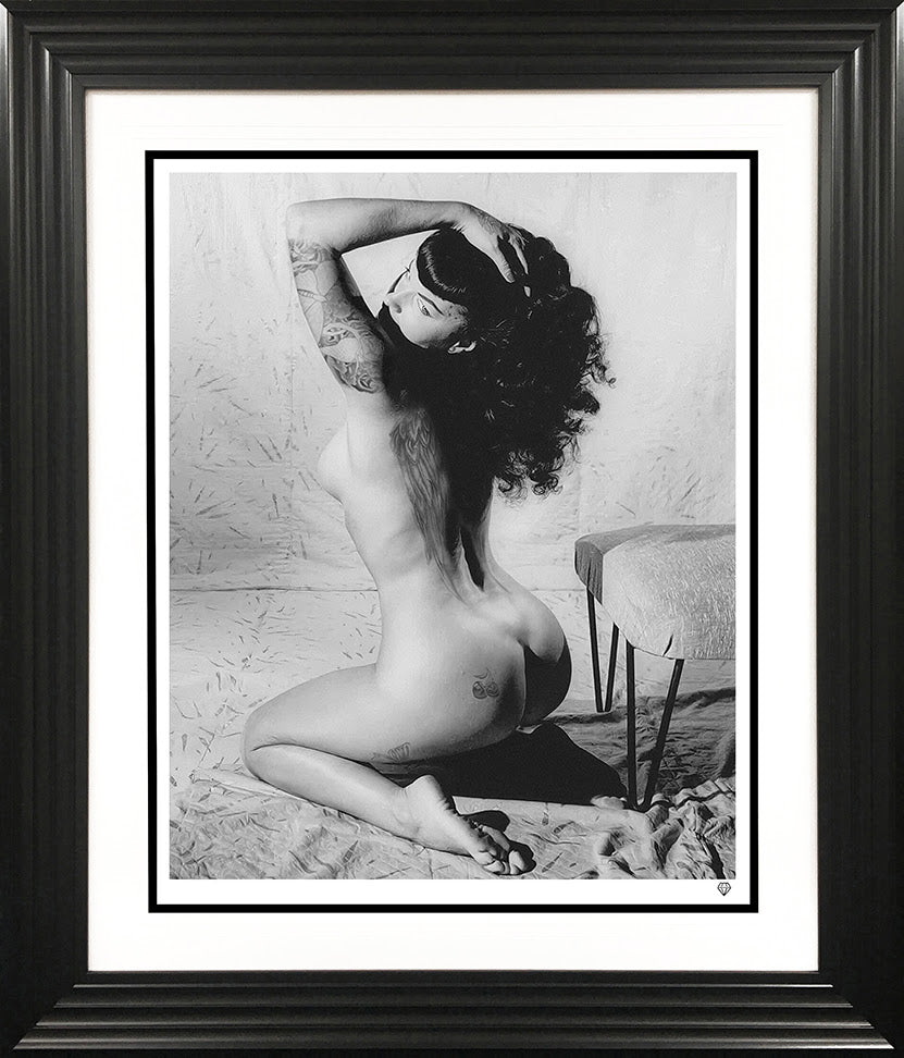 bettie page black and white print framed in black by artist JJ Adams