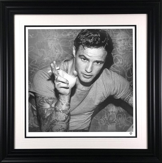 smoking gun brando black and white print framed in black by artist jj adams