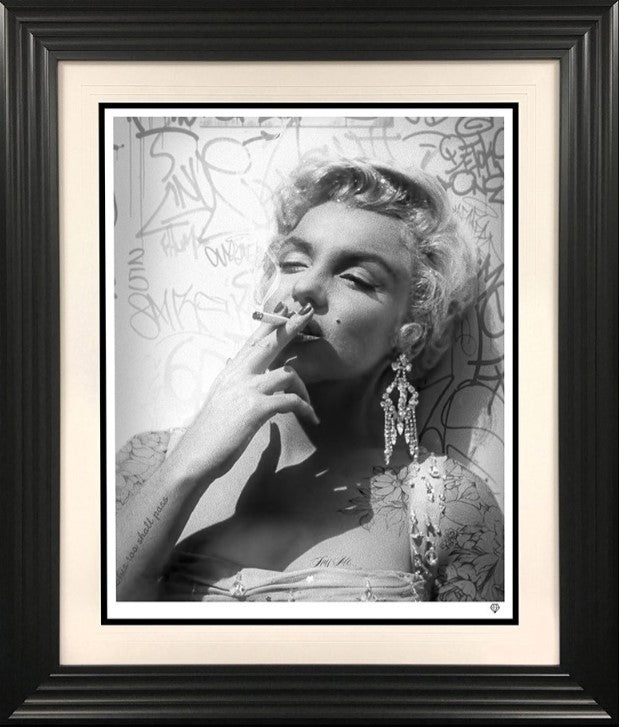 smoking gun marilyn black and white print framed in black by artist jj adams