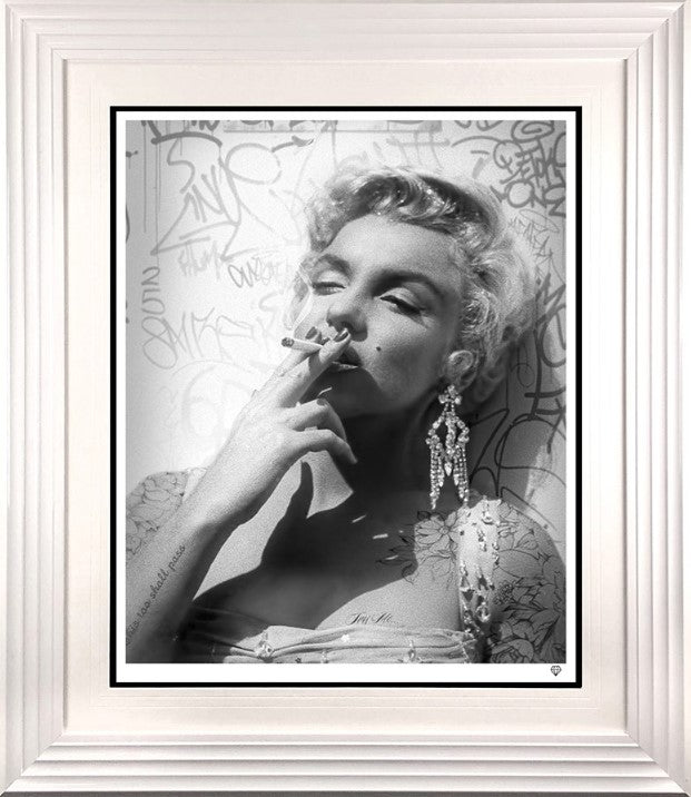 smoking gun marilyn black and white print framed in white by artist jj adams